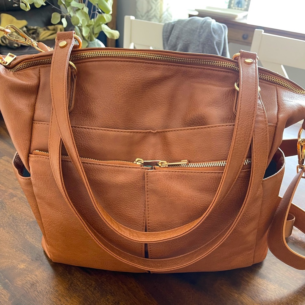 Tan leather Back and shoulder carry diaper bag